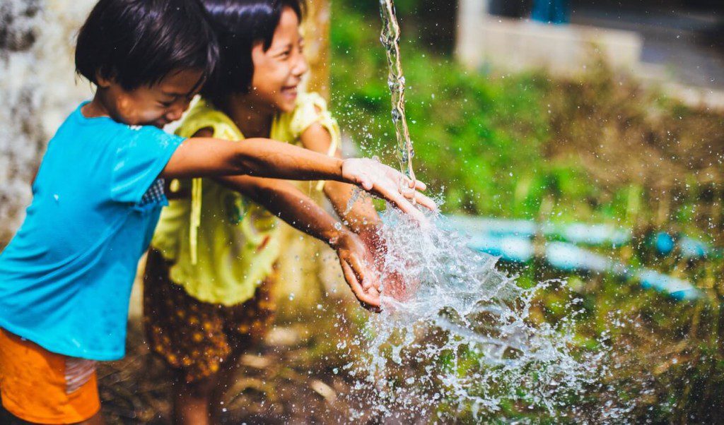 Children playing with water